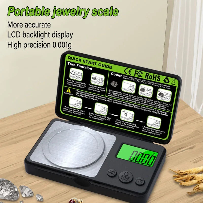 A portable LCD digital jewelry scale with a silver platform and green display is shown on a wooden surface.