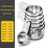 A silver stainless steel guide nozzle measuring cup set with various sizes and spoons.