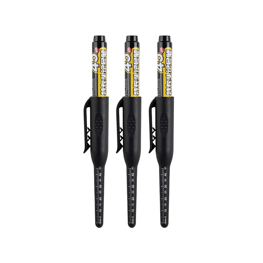 Three black precision deep hole marker pens standing upright.