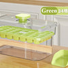 A clear plastic ice cube tray with a lid and storage box, featuring green silicone molds and a wooden base.