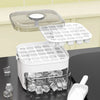 A white refrigerator ice maker with an easy-press lid and a clear compartment for ice cubes.