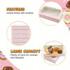 Pink decorative kraft paper cookie boxes with windows showing various cookies and desserts