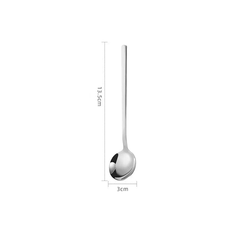 A silver-colored precision ceramic espresso coffee cup set with a long handle.