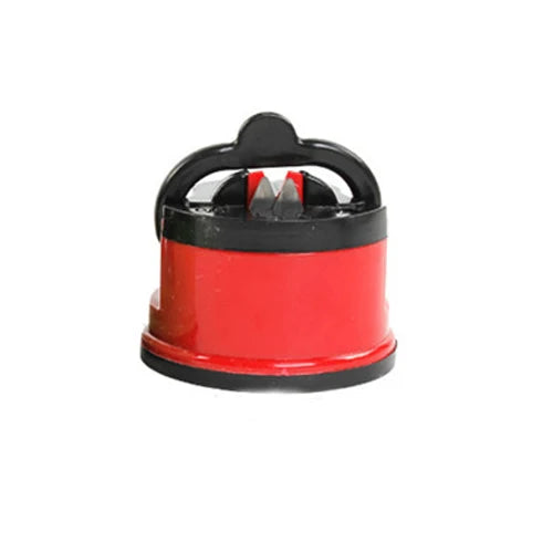 A red and black suction knife sharpener tool for kitchen tools.