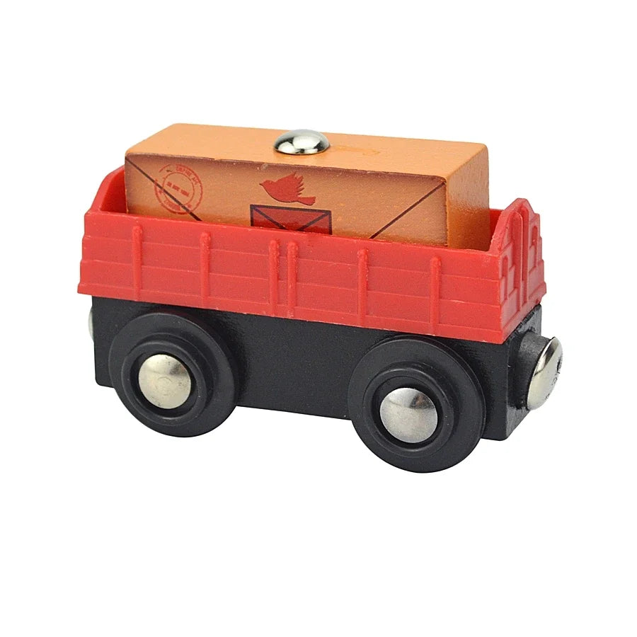A wooden magnetic train car set featuring an orange box on a red wagon with black wheels.