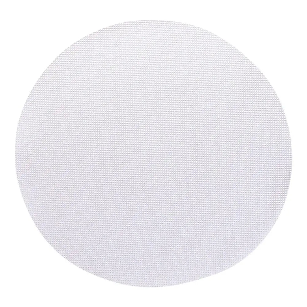 A circular white silicone steamer liner with a mesh texture.