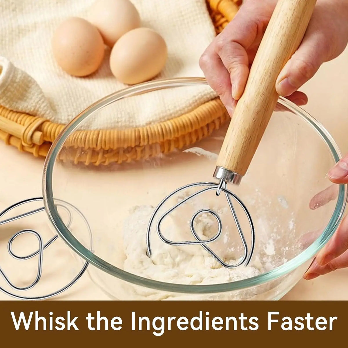 A hand is whisking ingredients in a glass bowl using a wooden whisk for a sourdough bread starter kit.
