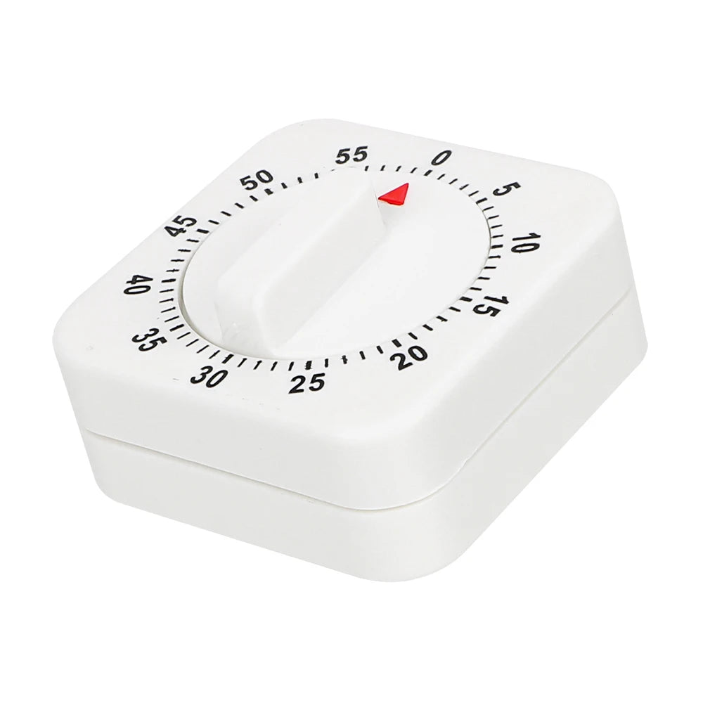 A white square mechanical kitchen timer with a circular scale marked from 0 to 55.