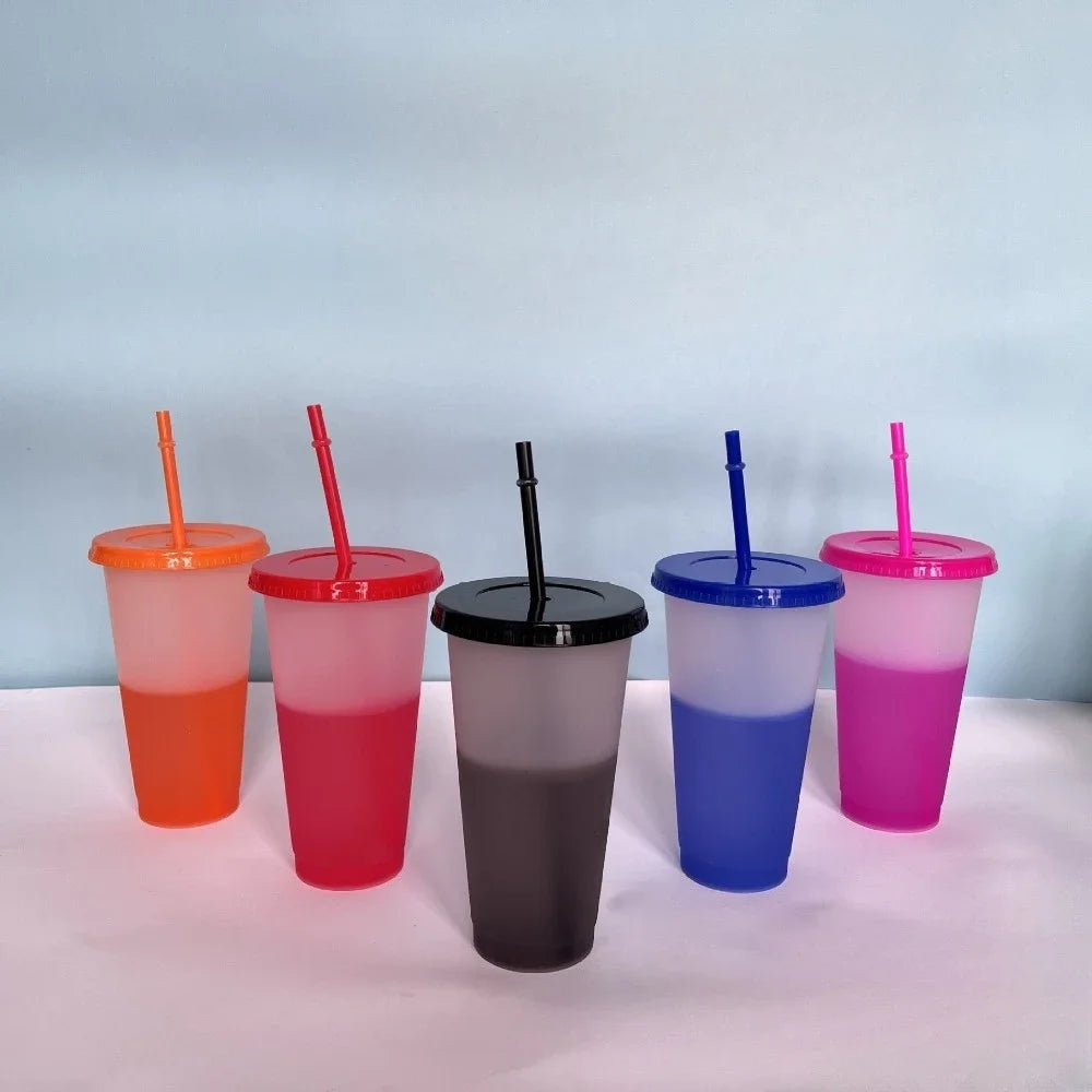 A set of five reusable plastic tumblers in various colors including orange, red, purple, blue, and pink, each with a straw.