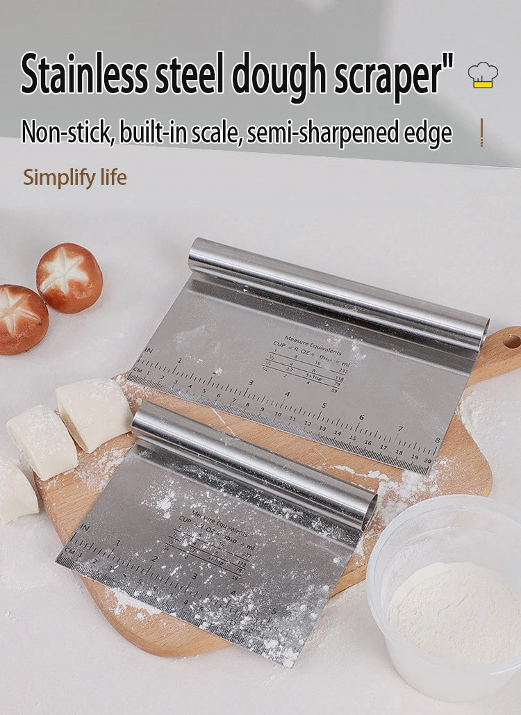 Stainless steel dough scraper and cutter with a measuring scale resting on a wooden board.