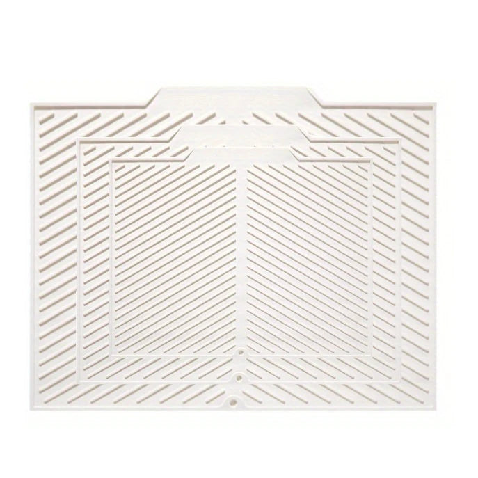 A white silicone collapsible dish drying mat with a textured, grid-like pattern.