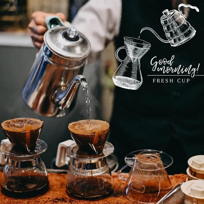 A glass percolator is pouring coffee into a glass cup, with several brewed cups visible below.