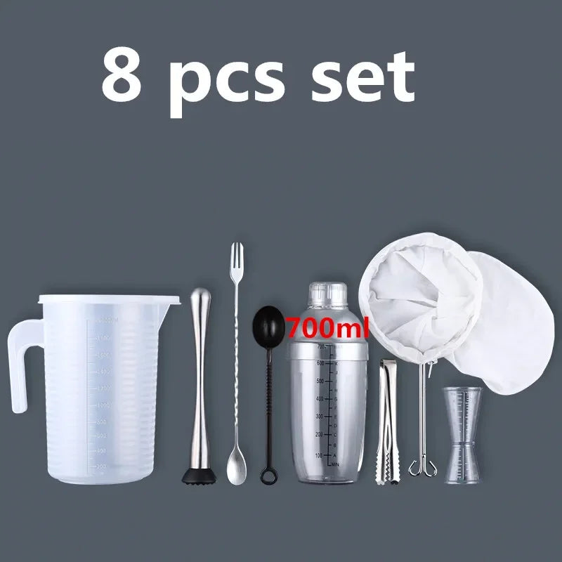 An 8 piece set of plastic cocktail shaker tools including a pitcher, stirring spoons, and muddler.