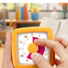 A hand holds a yellow visual timer with a pink and orange dial, showing the time at 55 seconds.