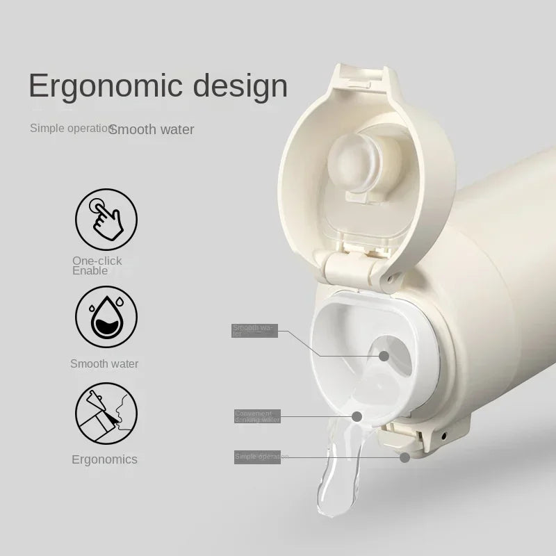 A white insulated stainless steel vacuum flask with an ergonomic design and a smooth water dispensing feature.