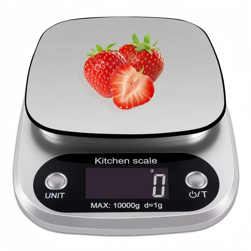 A silver digital kitchen scale is shown with strawberries on the weighing platform.