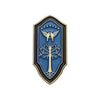 A blue enamel pin featuring a silhouette of a bird and a tree within an ornate shield design.