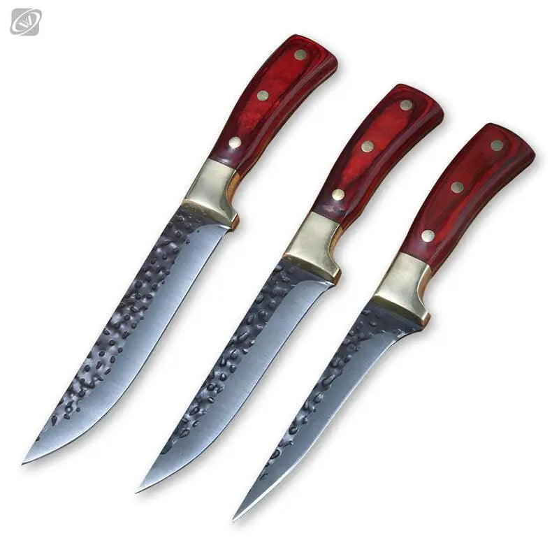 A set of three forged boning knives with wooden handles and stainless steel blades.