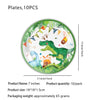 A green dinosaur themed plate with tropical leaves and colorful bunting decorations.