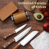 A set of knives and a wooden rolling knife sharpener kit displayed on a dark wooden surface.