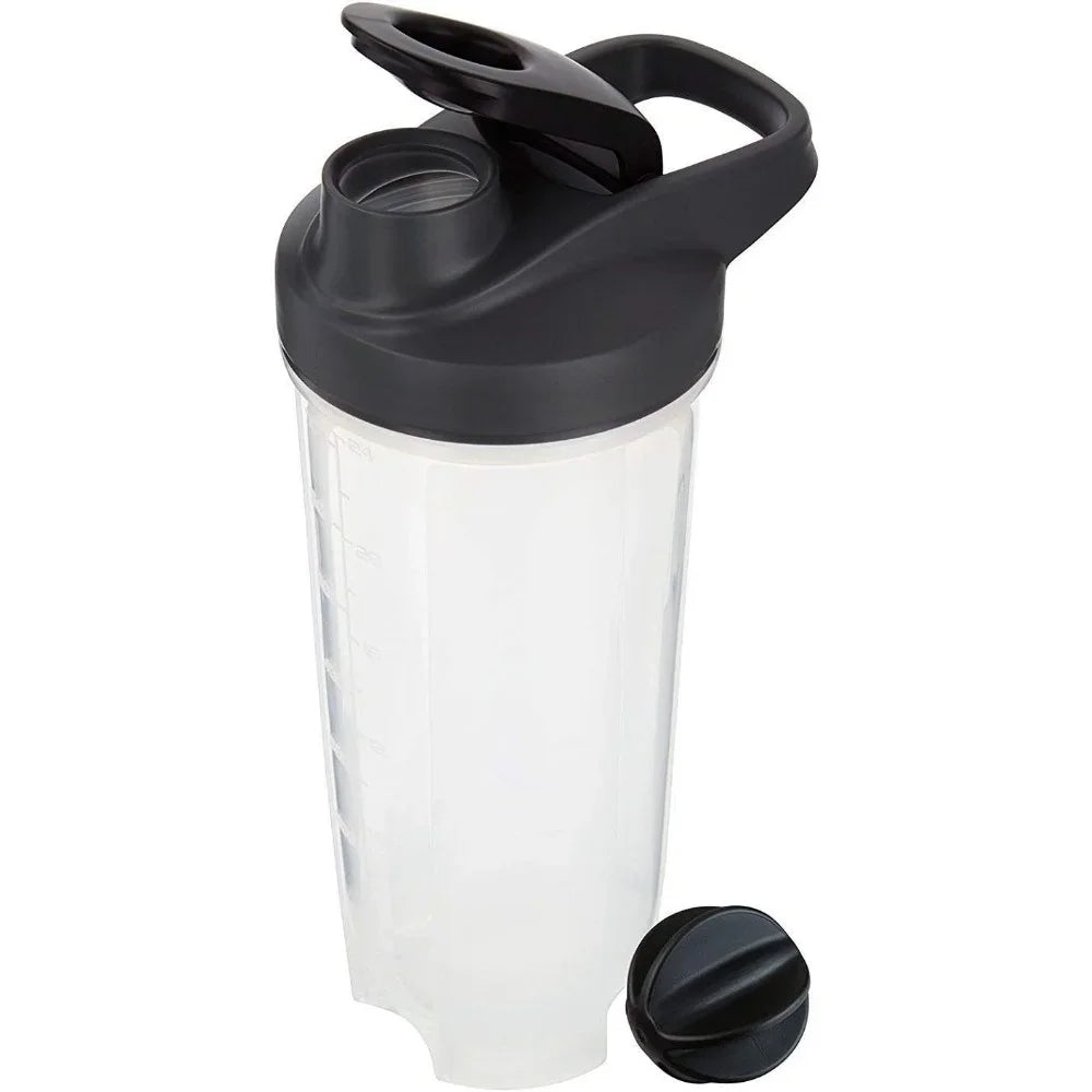 A clear plastic protein shaker bottle with a black lid and blender whisk.