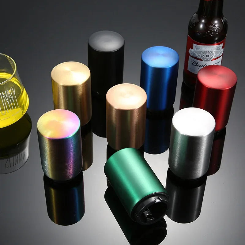 A collection of stainless steel automatic beer bottle openers in various colors and finishes, including gold, silver, blue, r