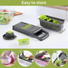 A set of multifunctional vegetable choppers and slicers in black and lime green plastic are shown on a white surface.