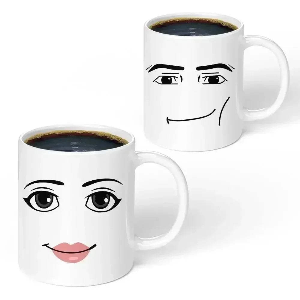 A white ceramic coffee mug featuring a simple, smiling face design.