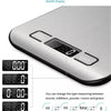 A silver portable digital kitchen scale with a backlit display showing 18.880 grams.