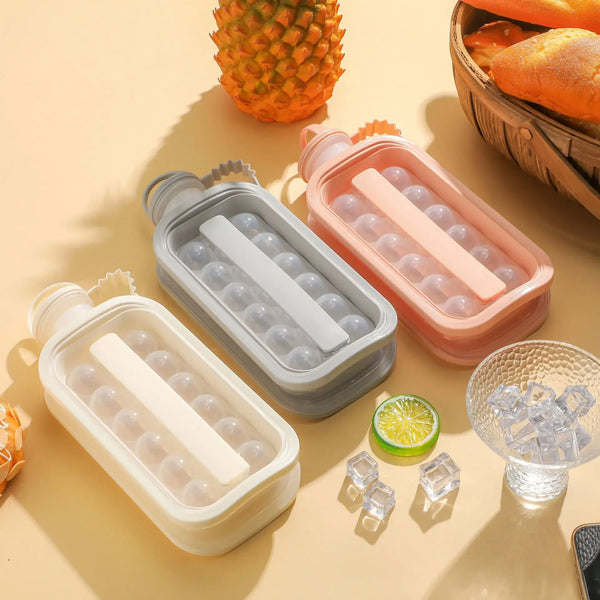 A set of portable ice cube makers in various colors and designs, including a round maker and bottle-shaped molds.