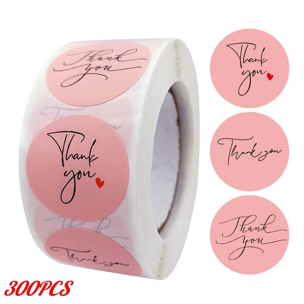 Roll of pink thank you adhesive stickers with individual thank you messages