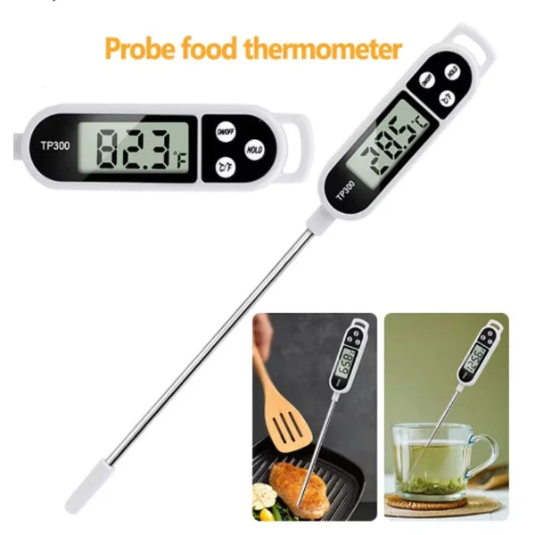 A digital probe food thermometer displays 38.5°C and is shown next to a measuring spoon in a glass of liquid.