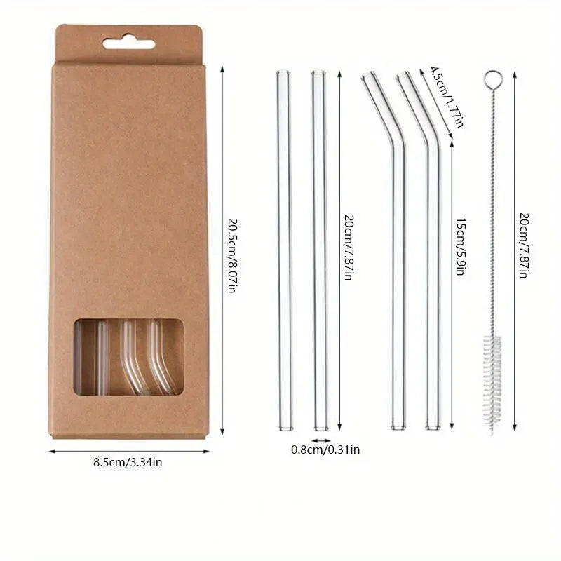 A brown cardboard box containing a set of reusable glass straws and cleaning tools.