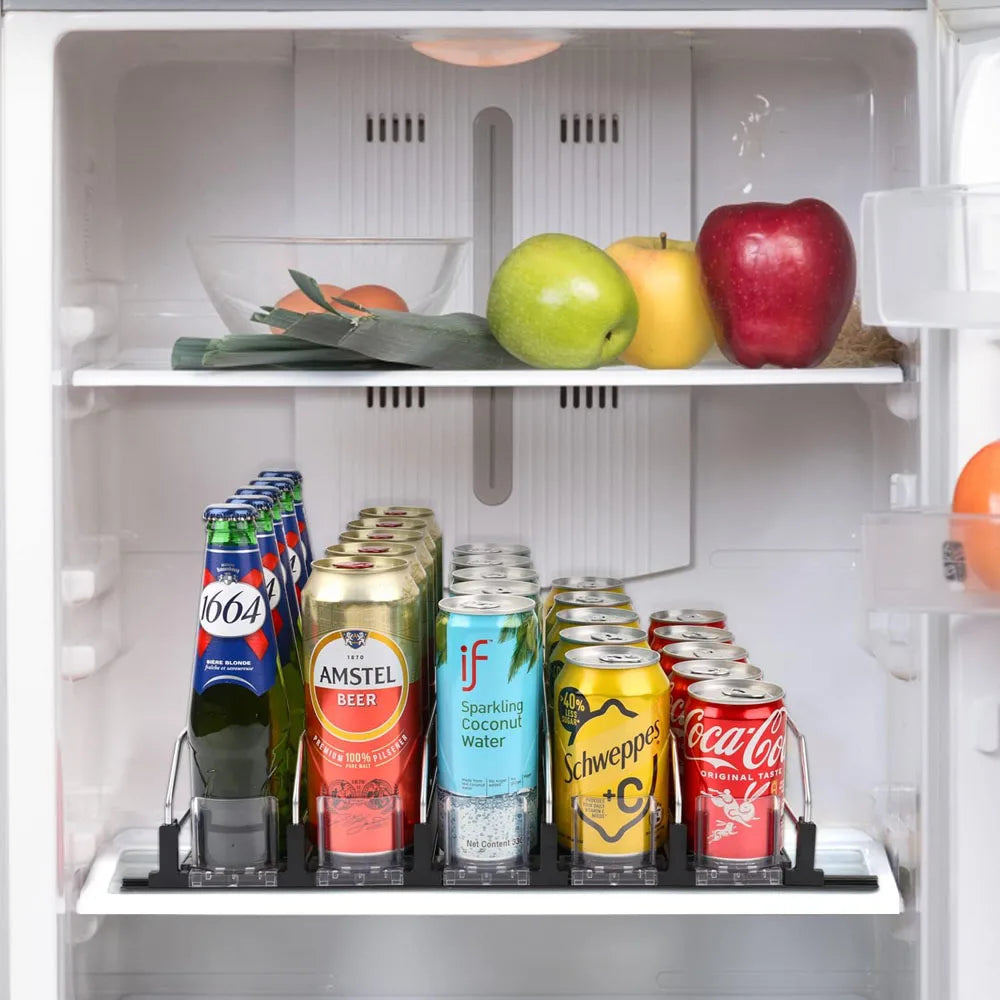 Adjustable spring-loaded organizer holding various canned and bottled beverages in a refrigerator shelf.