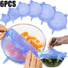 A set of six reusable silicone food lids and a clear glass bowl with food inside.