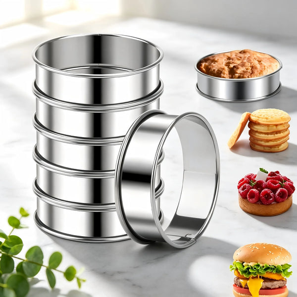 A stack of six stainless steel nonstick baking rings next to a muffin and a hamburger.