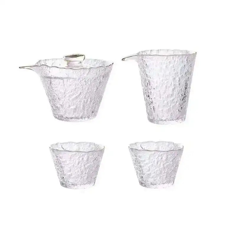 A set of three textured clear glass tea cups or bowls for a Chinese and Japanese ceremony.