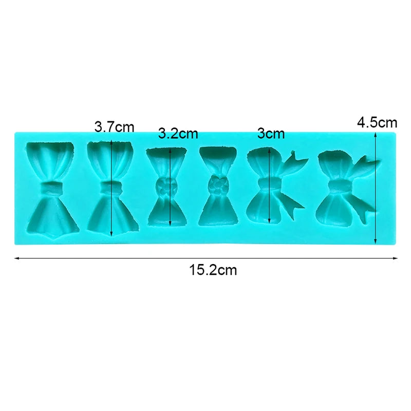 A silicone baking mold tray with multiple cupcake shapes for chocolate cupcakes.