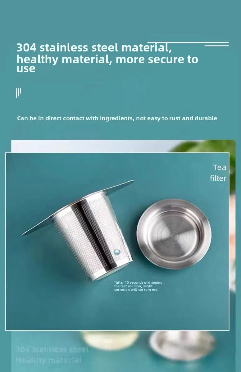 A stainless steel coffee filter funnel with a lid is shown next to other stainless steel components.
