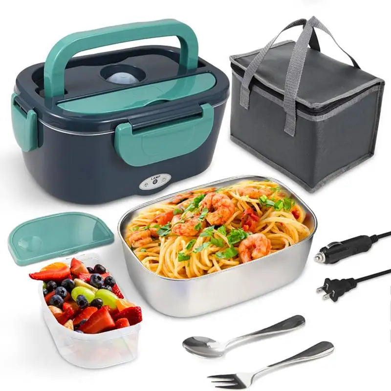 A portable electric heated lunch box with a lid, food compartment, and utensils shown next to fresh fruit.