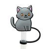 A gray cat silicone straw cover with orange eyes and pink inner ears mounted on a clear plastic stick.