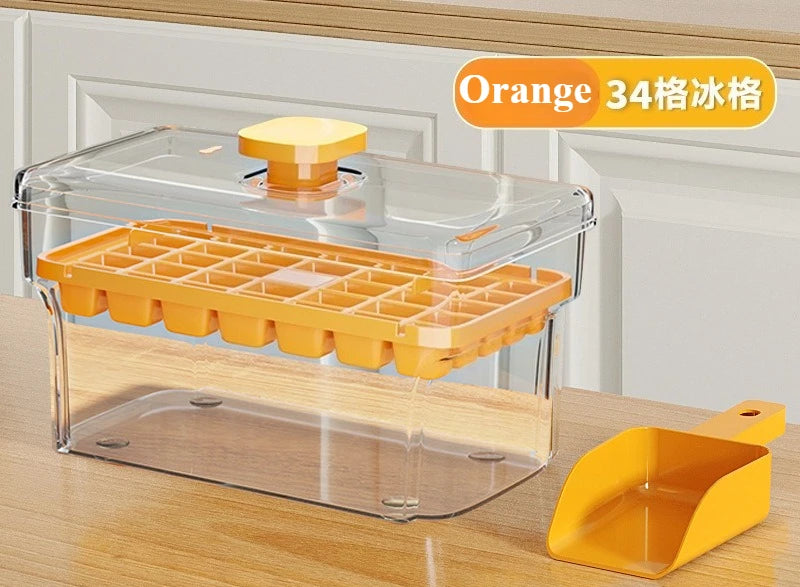 Orange ice cube tray with lid and storage box shown on a wooden surface.