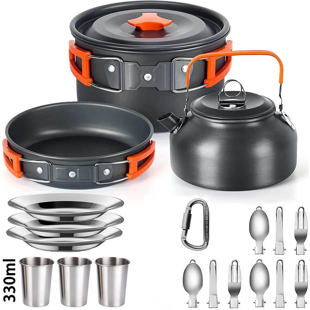 A set of camping cookware including a pot, lid, and various frying pans and cups.