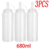 Three clear plastic squeeze condiment bottles with white caps and a 680ml capacity