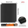 Two black oven liners or grill mats, 40cm long and 50cm wide, for baking.