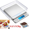 A precision digital kitchen scale with a clear glass platform and a digital display showing 0.00, used for weighing food.
