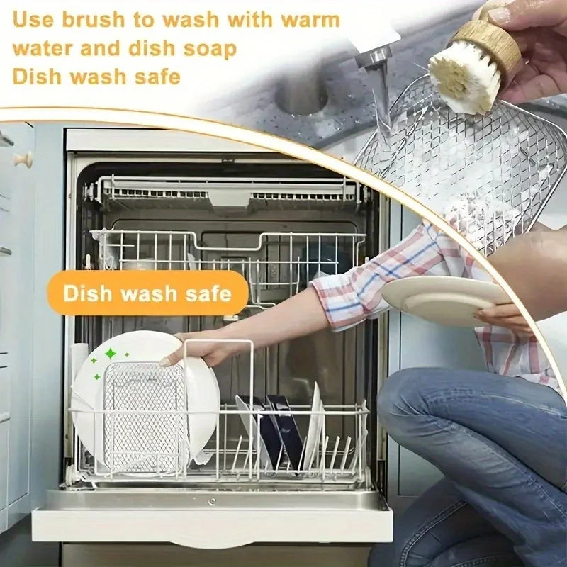 A hand is using a brush to wash a plate inside a stainless steel oven rack, demonstrating dish wash safety.