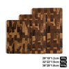 A set of three thick wooden cutting boards made from acacia wood with a distinctive checkered pattern.