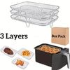 Stackable stainless steel grill racks in a box pack showing three layers and a black container.