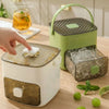A set of reusable grid ice cube molds in white and green are shown with ice cubes on a wooden surface.